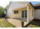 A cozy covered back patio enhances the exterior of this charming home at 7650 Micawber Ct, Indianapolis, IN 46256