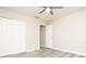 Bedroom features a ceiling fan, closet, and ensuite bathroom at 7650 Micawber Ct, Indianapolis, IN 46256