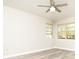 Bright bedroom featuring two large windows and neutral walls and flooring at 7650 Micawber Ct, Indianapolis, IN 46256