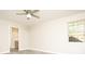 Bright bedroom with laminate flooring and a window letting in natural light at 7650 Micawber Ct, Indianapolis, IN 46256