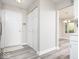 Inviting entry featuring hardwood floors, coat closet, and doorway to living space at 7650 Micawber Ct, Indianapolis, IN 46256