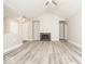 Spacious living room with vaulted ceilings and a cozy fireplace at 7650 Micawber Ct, Indianapolis, IN 46256