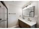 Bathroom features a double sink vanity, walk-in shower and a modern design at 7918 Wolfgang Pl, Indianapolis, IN 46239