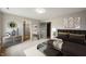 A furnished bedroom with carpet, neutral walls, a dresser, and artwork create a cozy and stylish space at 7918 Wolfgang Pl, Indianapolis, IN 46239