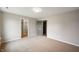 A spacious bedroom features neutral walls and carpet, with a closet and ensuite bathroom nearby at 7918 Wolfgang Pl, Indianapolis, IN 46239
