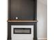 A modern fireplace design with a decorative mantel enhances the ambiance of the living space at 7918 Wolfgang Pl, Indianapolis, IN 46239
