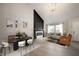 Open-concept space with living, dining, and kitchen areas, perfect for modern living at 7918 Wolfgang Pl, Indianapolis, IN 46239