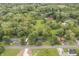 A bird's eye view captures the house, its surroundings, and a charming neighborhood at 8933 W 1050 S, Fortville, IN 46040