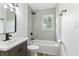 Bathroom with a vanity, bathtub, and modern finishes at 8933 W 1050 S, Fortville, IN 46040
