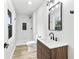 Bathroom featuring shower, modern vanity and mirror and plenty of light at 8933 W 1050 S, Fortville, IN 46040