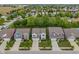Aerial view of a neighborhood showcasing well-maintained homes, tree-lined streets, and green spaces at 918 Cass Dr, Franklin, IN 46131