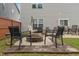 Inviting backyard with a charming fire pit area and comfortable seating arrangement, perfect for gatherings at 918 Cass Dr, Franklin, IN 46131
