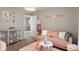 Bedroom featuring pink decor, a stylish sofa, and modern accents at 918 Cass Dr, Franklin, IN 46131