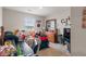 Bedroom with a bed full of stuffed animals, a dresser, and personalized wall art at 918 Cass Dr, Franklin, IN 46131