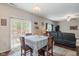 Bright dining area with a sliding door that opens to an outdoor living space at 918 Cass Dr, Franklin, IN 46131