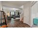 Open concept living room with wood flooring, leather sofas, and a ceiling fan at 918 Cass Dr, Franklin, IN 46131