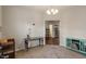 Living room with gray walls, carpeted floors, and an arched doorway at 918 Cass Dr, Franklin, IN 46131