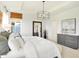 Spacious bedroom featuring a tray ceiling, decor and natural light at 9351 Abner St, McCordsville, IN 46055