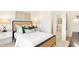 Bedroom featuring a wicker bed frame, with an ensuite bathroom at 9351 Abner St, McCordsville, IN 46055
