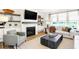 Comfortable living room with a cozy fireplace and built-in shelving, perfect for relaxing at 9351 Abner St, McCordsville, IN 46055