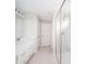 Bright bathroom with double vanity, glass enclosed shower, and neutral color palette at 9369 Casey Rd, Pendleton, IN 46064