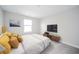Comfortable bedroom with a window and a TV, with neutral color palette at 9369 Casey Rd, Pendleton, IN 46064