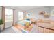 Comfortable bedroom with a window and a bed with yellow and blue covers at 9369 Casey Rd, Pendleton, IN 46064