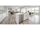Open-concept kitchen featuring an island with stainless steel appliances at 9369 Casey Rd, Pendleton, IN 46064