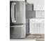 Close-up of a modern stainless steel refrigerator and white cabinetry at 9369 Casey Rd, Pendleton, IN 46064