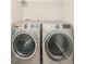 Laundry room features a side-by-side washer and dryer, providing convenience at 9369 Casey Rd, Pendleton, IN 46064
