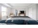 Spacious bedroom featuring a large window, neutral tones and tray ceiling at 9369 Casey Rd, Pendleton, IN 46064