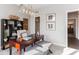Stylish home office featuring modern decor, a spacious desk, and ample natural light at 9387 Abner St, McCordsville, IN 46055
