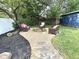 Cozy backyard retreat with gravel pathways and comfortable seating arranged around a central fire pit at 949 E Southern Ave, Indianapolis, IN 46203