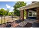 Relaxing porch seating area with modern wicker furniture, perfect for enjoying outdoor views at 949 E Southern Ave, Indianapolis, IN 46203