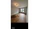 This room features light walls and flooring at 9560 Bay Vista E Dr, Indianapolis, IN 46250