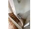 Hall with stairs, tile, and light blue walls at 9560 Bay Vista E Dr, Indianapolis, IN 46250