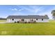 Rear exterior of home with a large deck and backyard at 9605 W 100 S, Jamestown, IN 46147