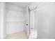 Walk-in closet with wire shelving and tiled floors offers ample storage space at 9605 W 100 S, Jamestown, IN 46147