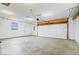 Spacious garage with ample lighting and garage door opener at 9605 W 100 S, Jamestown, IN 46147