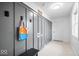 Hallway with hooks, storage, and a gray accent wall at 9605 W 100 S, Jamestown, IN 46147