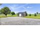 Shed in yard with gravel surrounding it at 9605 W 100 S, Jamestown, IN 46147