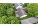 A bird's-eye view of a well-kept home, highlighting its manicured lawn and secluded backyard, ideal for serene living at 975 Atir Ln, Greenfield, IN 46140