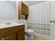 Bathroom boasts a vanity, toilet and shower with modern fixtures and finishes at 975 Atir Ln, Greenfield, IN 46140