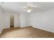 Spacious bedroom with wood floors and access to a large walk-in closet and bathroom at 975 Atir Ln, Greenfield, IN 46140
