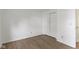 This bedroom features wood-look floors and a closet for plenty of storage at 975 Atir Ln, Greenfield, IN 46140