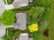 Aerial view of home showcasing lush landscaping, mature trees, and backyard features at 10501 Greenway Dr, Fishers, IN 46037