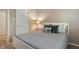 Comfortable bedroom with a decorative bed, a lamp-lit side table, and neutral colors at 10501 Greenway Dr, Fishers, IN 46037