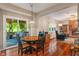 Inviting dining area features wood floors and sliding door access to the outdoor patio at 10501 Greenway Dr, Fishers, IN 46037