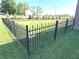 Fully fenced backyard with lush green grass offers privacy and security in a well-maintained outdoor space at 1056 Bent Branch Ln, Greenwood, IN 46143