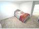 Bedroom featuring soft gray carpet and a bed with gray and orange accents at 1056 Bent Branch Ln, Greenwood, IN 46143